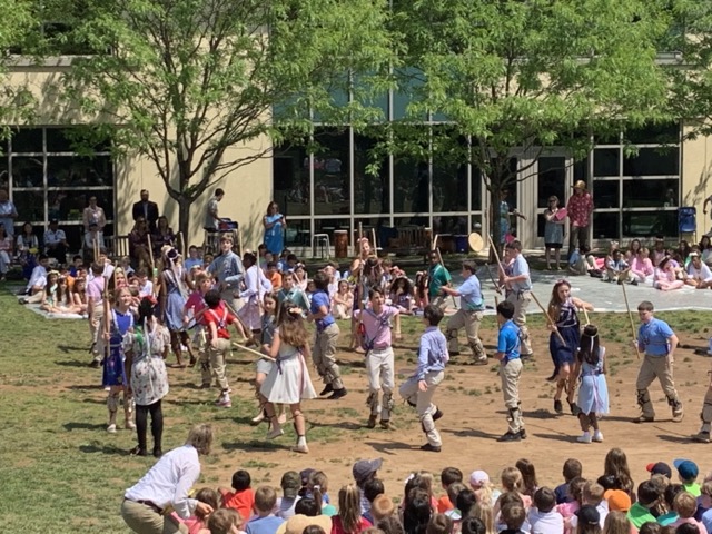 Students participate in the Morris Dance during May Day in 2019.