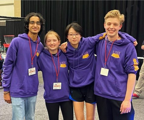 Rohan, Claire, Elaina, and Ben (l to r) celebrate their successful tournament.
