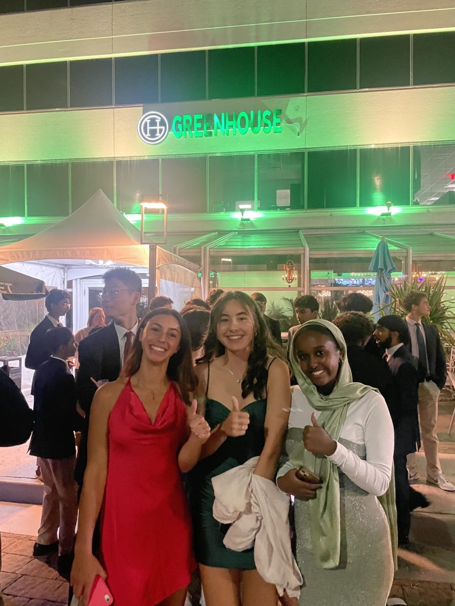Sophomores Maria Lerner, Alejandra Villafuerte, and Hafsa Abdulkadir in front of Greenhouse Bistro, where the 10th grade had dinner before the dance.