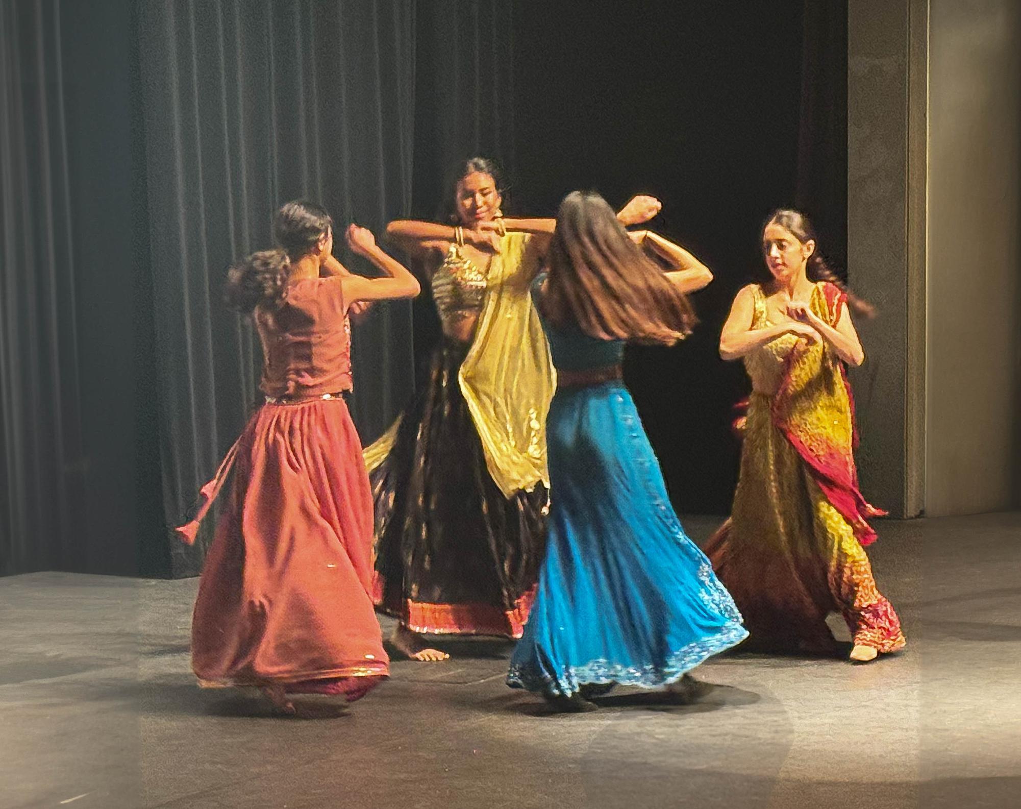 Meera Desai ‘25, Karina Satoskar ‘25, Anya Aggarwal ‘25, Anaahita Kaashyap ‘25 perform a traditional Garba dance.