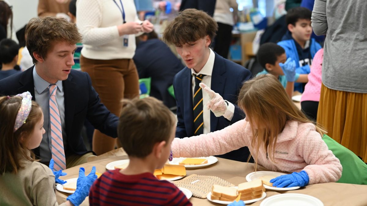 Seniors make sandwiches with lower school students